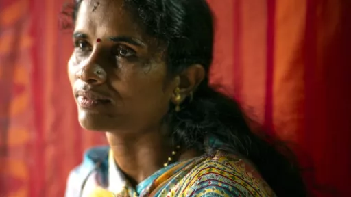 Portrait of woman in multicolored sari 