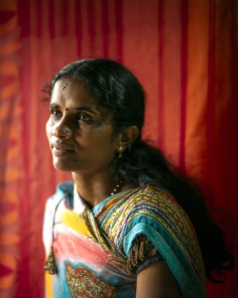 Portrait of woman in multicolored sari 